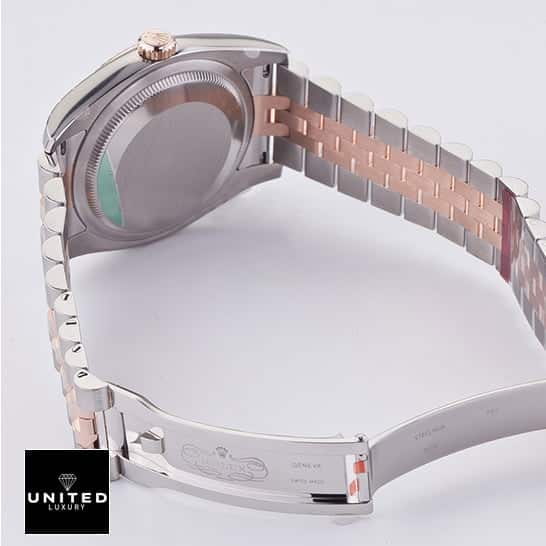 Rolex Datejust 116231-0105 "Chocolate Floral Dial" Ultra Clone 1:1 rolex floral dial replica3 Rolex Datejust 36 116231 Two Tone Jubilee Bracelet Replica Open Fold Clasp on the table