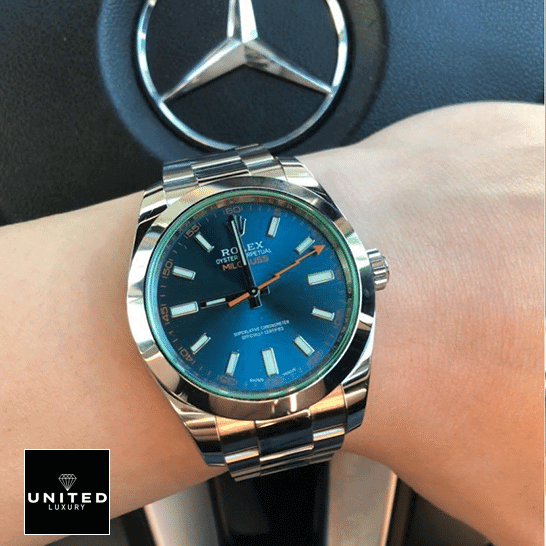 Rolex Milgauss Blue Dial 116400GV-0002 Super Clone Edition Rolex Milgauss 116400GV Green Crystal Oyster Replica on his arm and Mercedes logo on the back