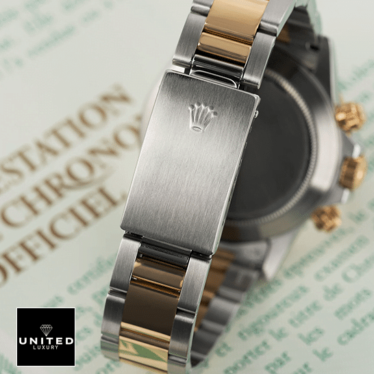 Rolex Daytona Cosmograph 16523 "Yellow Gold" Elite Clone Edition rolexdaytona 16523 replica clasp Rolex Daytona S.Steel Two Tone Bracelet Fold Clasp 16523 Replica on the table