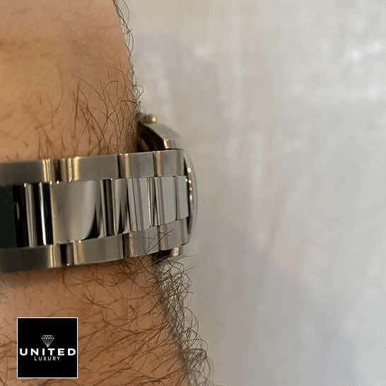 Rolex Datejust 126200-0008 White Dial Swiss Super Clone rolex datejust 126200 0008 replica steel he's wearing a Rolex Datejust 26200-0008 bracelet