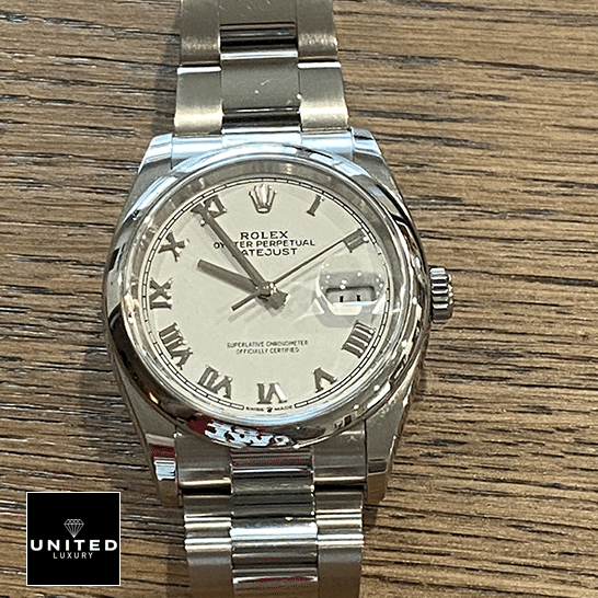 Rolex Datejust 126200-0008 White Dial Swiss Super Clone rolex datejust 126200 0008 replica white Rolex Datejust 126200-0008 White dial on the table
