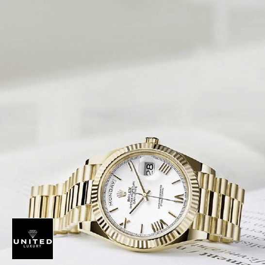 Rolex Day-Date 228238-0042 "Gold Roman Dial" Ultimate Clone Quality rolex day date 228238 0042 replica tiltedleft Rolex Day-Date 40 228238 Replica on the book