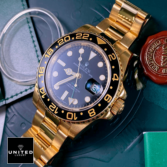Rolex GMT-Master II 116718LN Ultra Realistic Replica Rolex GMT-Master II 116718LN Gold Watch Black Dial Oyster Replica on the box