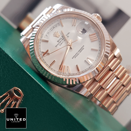 Rolex Day-Date 228235 "White Dial" Signature Replica 1:1 rolex day date 228235 KW rose gold white dial replica left side Rolex Day-Date 228235 White Dial Romen Numerial Replica on the Rolex Box
