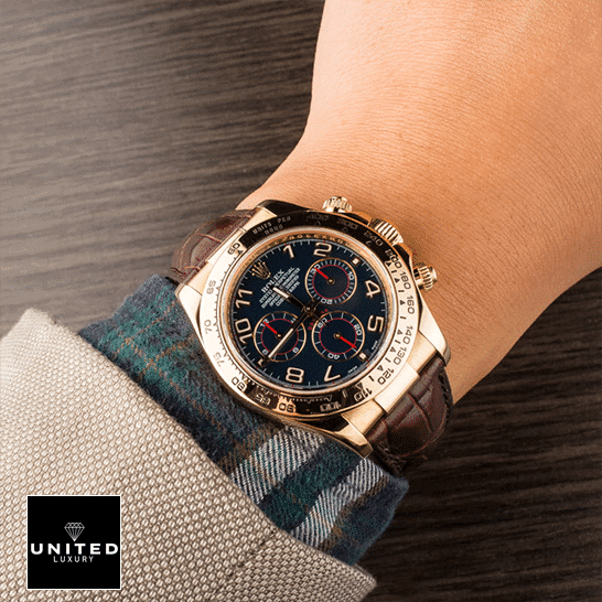 Rolex Cosmograph Daytona 116518 Super Clone rolex daytona cosmograph 116518 yellow gold blue dial replica unitedluxurynet 1 Rolex Daytona Yellow Gold Case 116518 Replica on his arm