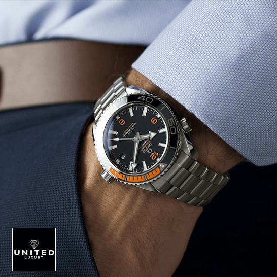 Omega Seamaster Planet Ocean Co-Axial Master Chronometer 215.30.44.21.01.002 Exact Replica 1:1 omega seamaster planet ocean steel hand Omega Black Dial Orange Bracelet Oyster Replica on the man in the suit