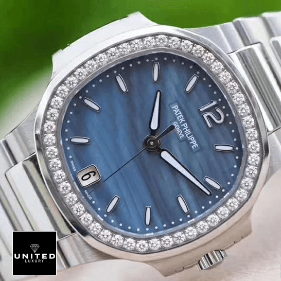 Patek Philippe Nautilus Ladies 7018/1A Elite Clone Edition patek philippe nautilus 70181A replica tiltedright Patek Philippe Blue Dial Stainless Steel Diamond Bezel Replica front view