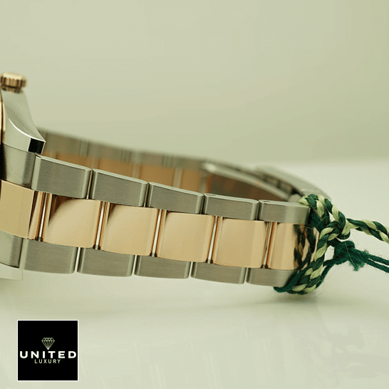 Rolex Datejust 126331 Mother Of Pearl Elite Clone Edition Rolex Datejust 41 126331-0013 Two Tone Oyster Bracelet Replica on the table