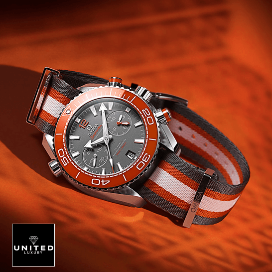 Omega Seamaster Planet Ocean 215.32.46.51.99.001 "Grey" Premium Duplicate Edition omega seamaster planet ocean 215.32.46.51.99.001 replica tiltedleft Omega Seamaster Orange Bezel Grey Dial Replica orange background