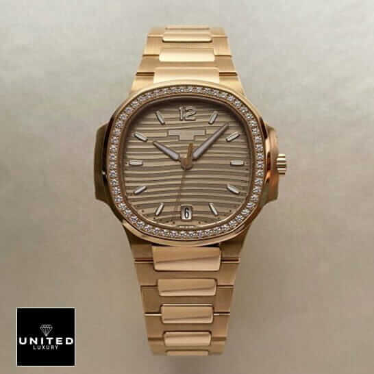 Patek Philippe Nautilus 7118-1200r-010 Rose Gold Exceptional Replica 1:1 patek 7118 1200r 010 replica 1 Patel Philippe Geneve Gold Diamond Bezel Replica front view rose gold background