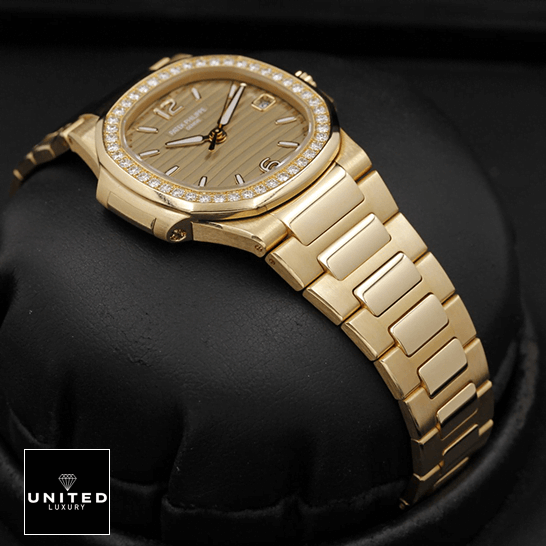 Patek Philippe Nautilus 7010/1R "Golden Dial" Collector’s Copy 1:1 patek philippe nautilus 70101R 012 replica bracelet Patek Philippe Nautilus 70101R-012 Diamond Bezel Replica in the black box
