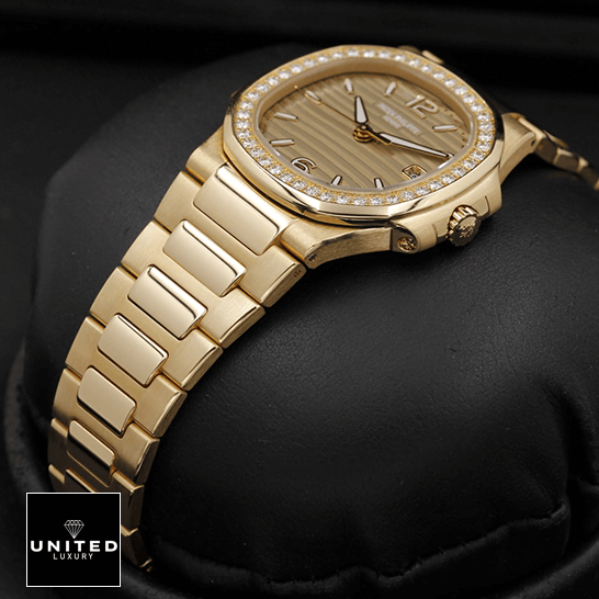 Patek Philippe Nautilus 7010/1R "Golden Dial" Collector’s Copy 1:1 patek philippe nautilus 70101R 012 replica side Patek Philippe Nautilus Rose Gold Dial Replica in the black box
