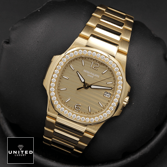 Patek Philippe Nautilus 7010/1R "Golden Dial" Collector’s Copy 1:1 patek philippe nautilus 70101R 012 replica tiltedright Patek Philippe Nautilus 70101R-012 Rose Gold Bracelet Replica black background