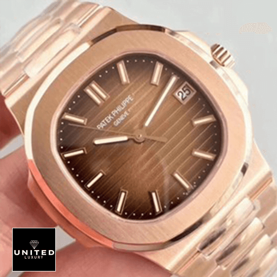 Patek Philippe Nautilus 5711/1R-001 Rose Gold Collector’s Clone 1:1 patek philippe nautilus 57111R 001 left Patek Philippe Nautilus 57111R-001 Rose Gold Bezel Replica on the hand