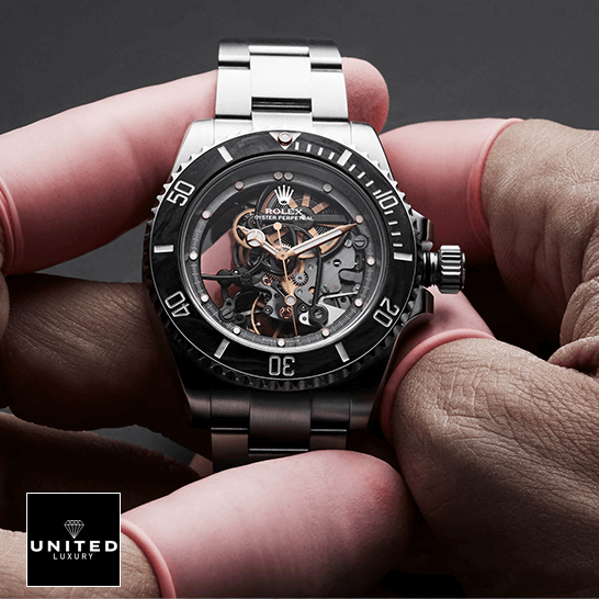 Rolex Submariner 114200 "Skeleton" Perfect Clone Quality rolex oyster perpetual skeleton dial steel 114200 front hand Rolex 114200 Skeleton Dial Replica on the hand