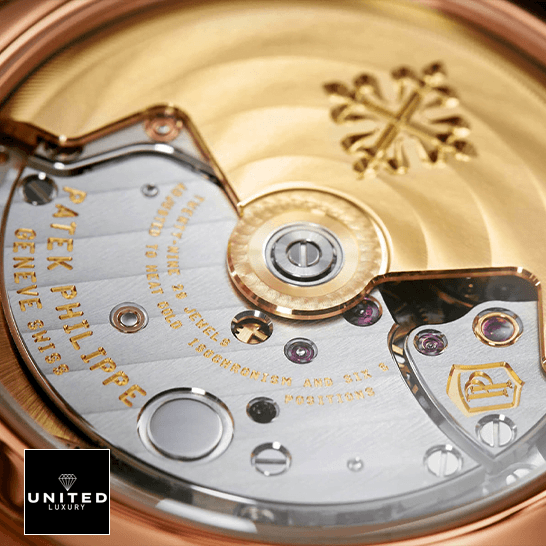 Patek Philippe Nautilus 7118/1R "Ladies Rose Gold" 1:1 Master Replica patek philippe nautilus ladies golden rose gold 71181R 001 replica caliber Patek Philippe Nautilus Ladies Golden Rose Geneve Replica close mechanism view