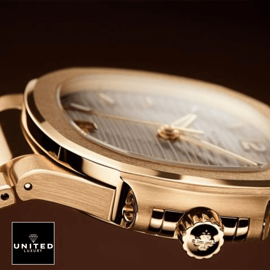 Patek Philippe Nautilus 7118/1R "Ladies Rose Gold" 1:1 Master Replica patek philippe nautilus ladies golden rose gold 71181R 001 replica right Patek Philippe Nautlus Ladies Golden Rose Replica side view crown on the logo