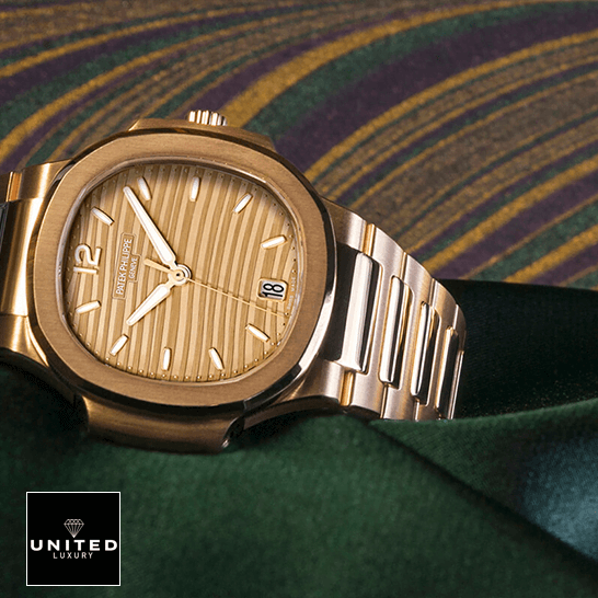 Patek Philippe Nautilus 7118/1R "Ladies Rose Gold" 1:1 Master Replica patek philippe nautilus ladies golden rose gold 71181R 001 replica side Patek Philippe Nautilus Ladies Golden Rose Gold 71181R-001 Replica