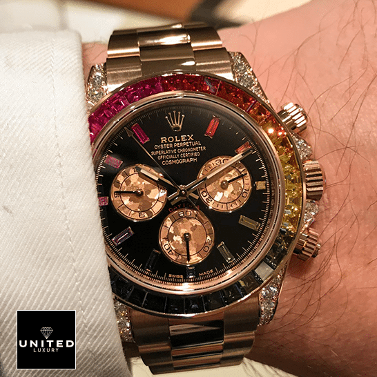 Rolex Cosmograph Daytona "Rainbow" 116519 Premium Duplicate Edition Rolex Daytona Cosmograph Rainbow Bezel Black Dial 116519 Oyster Replica on his hands