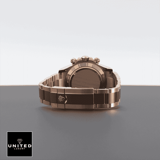 Rolex Cosmograph Daytona 116505 "Chocolate Dial" Premium Clone Edition Rolex Daytona 116505-0013 Oyster Bracelet Fold Clasp on the Rolex Logo Replica on the table