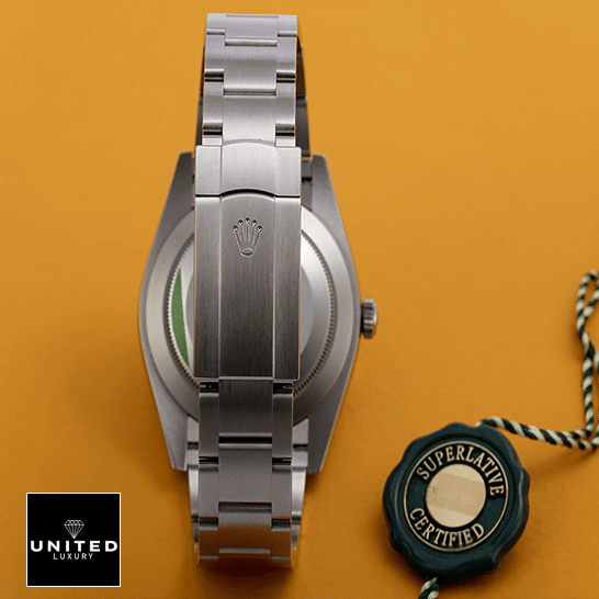 Rolex Oyster Perpetual 124300 "Orange Dial" Deluxe Clone 1:1 rolex oyster perpetual yellow dial 124300 replica back unitedluxurynet 1 Rolex Perpetual 124300 Stainless Steel Oyster Bracelet Replica Fold Clasp on the Rolex Logo and Orange Background