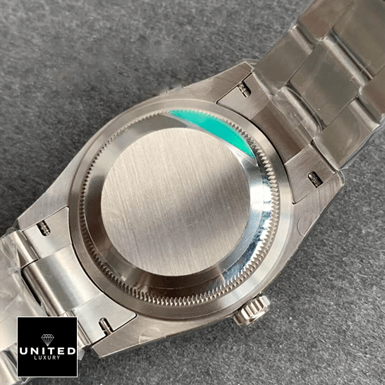 Rolex Datejust 36 Perpetual 116200 Stainless Steel Case Replica on the table