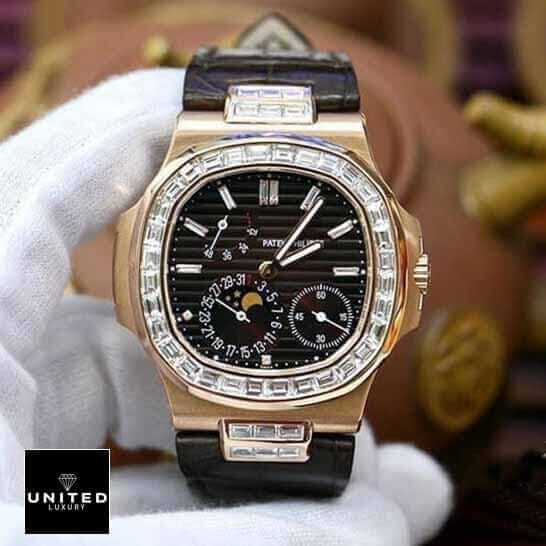 Patek Philippe Nautilus 5724 "Baguette Diamonds" 1:1 Clone Edition patek philippe baguette replica 5 Patek Philippe Black Dial Diamond Bezel Leather Bracelet Replica on the hand
