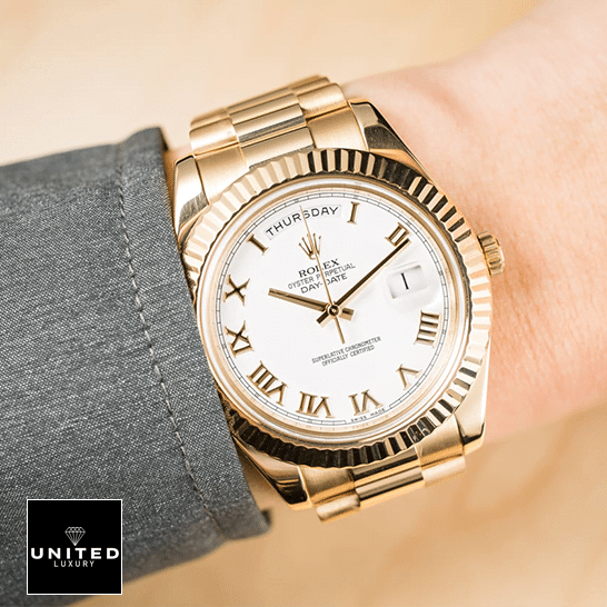 Rolex Day-Date 218238 "Presidential" Ultra Fine Replica rolex day date II collection gold silver white dial 218238 man hand Rolex Day-Date II Collection Gold Silver White Dial 218238 Replica on is arm