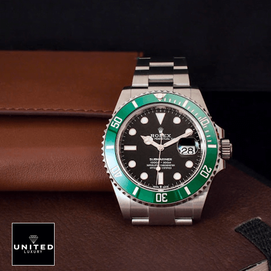 Rolex Submariner 126610LV "Kermit" Exclusive Clone 1:1 rolex submariner date 126610LV replica front Rolex Submariner 126610LV Black Dial Replica leather table top