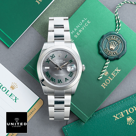 Rolex Datejust 126333 "Wimbledon Dial" First-Class Replica Rolex Datejust Wimbledon 126300-0013 Oyster Replica & Guarantee Card on the table