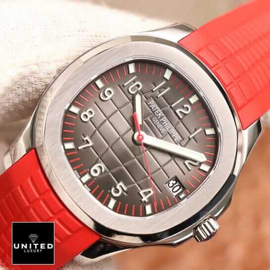 Patek Philippe Aquanaut 5167A "Red Dial" Exceptional Replica 1:1 1 200301204202 Patek Philippe Geneve Brown Dial Red Rubber Bracelet Replica on the hand