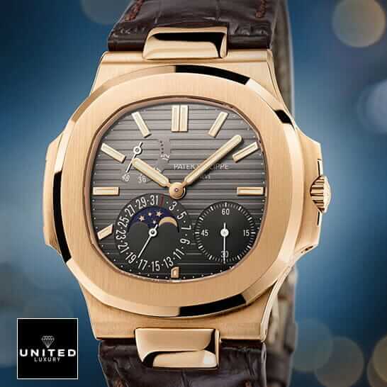 Patek Philippe Nautilus 5712R-001 "Rose Gold" High Fidelity Replica patek nautilus 5712r rose gold luxury 2 1 Patek Philippe Nautilus Black Dial Leather Bracelet Replica blue background