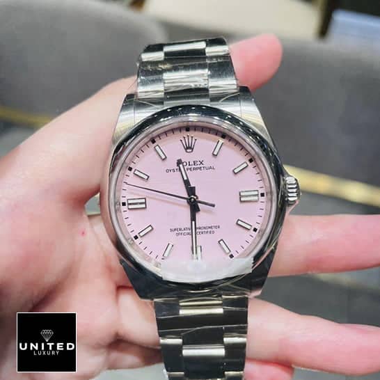 Rolex Milgauss Oyster Perpetual 124300 "Candy Pink" Collector’s Clone 1:1 rolex oyster perpetual 126000 replica 2 Rolex Oyster Perpetual 124300 Oyster Replica on his hand