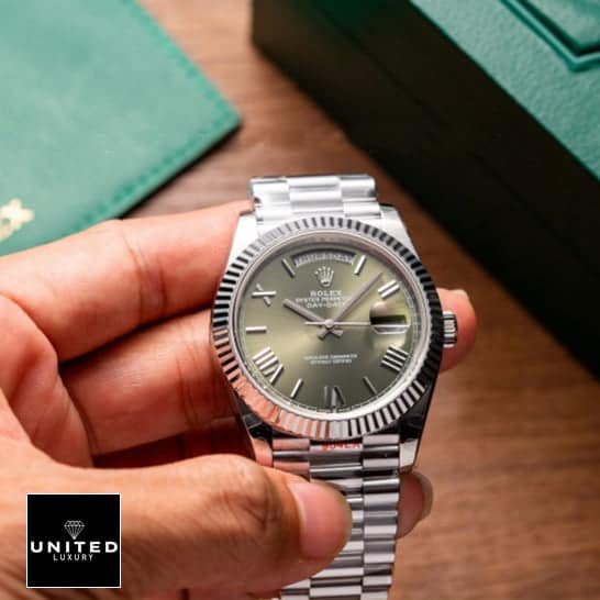 Rolex Day-date green dial roman replica on the hand with