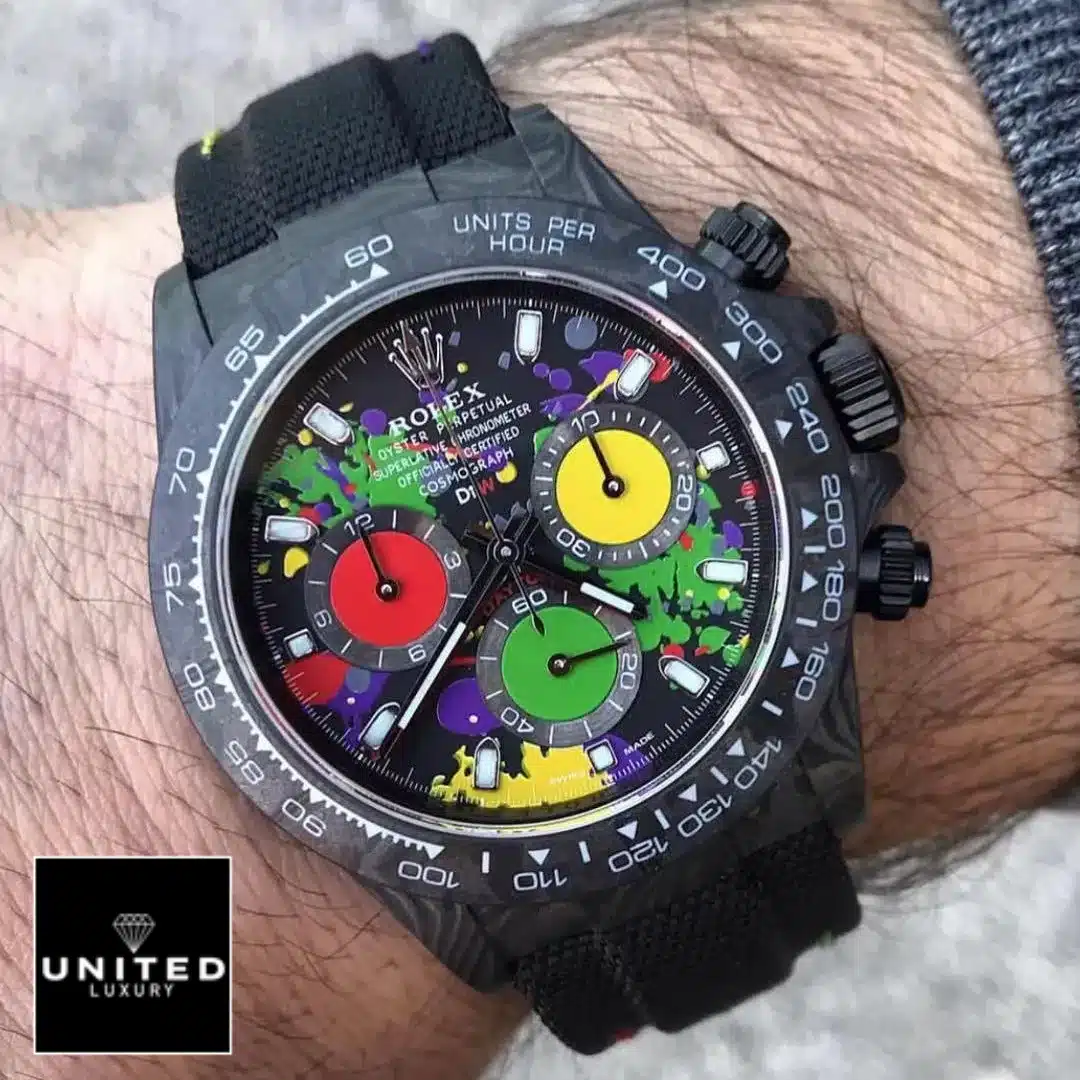 Rolex Daytona Carbon Rainbow Dial Black Button & Crown Pusher 4130cr Replica on his arm