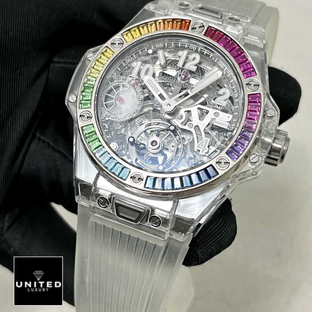 Hublot Big Bang Rainbow Bezel White Rubber Bracelet Replica on the black glove hand