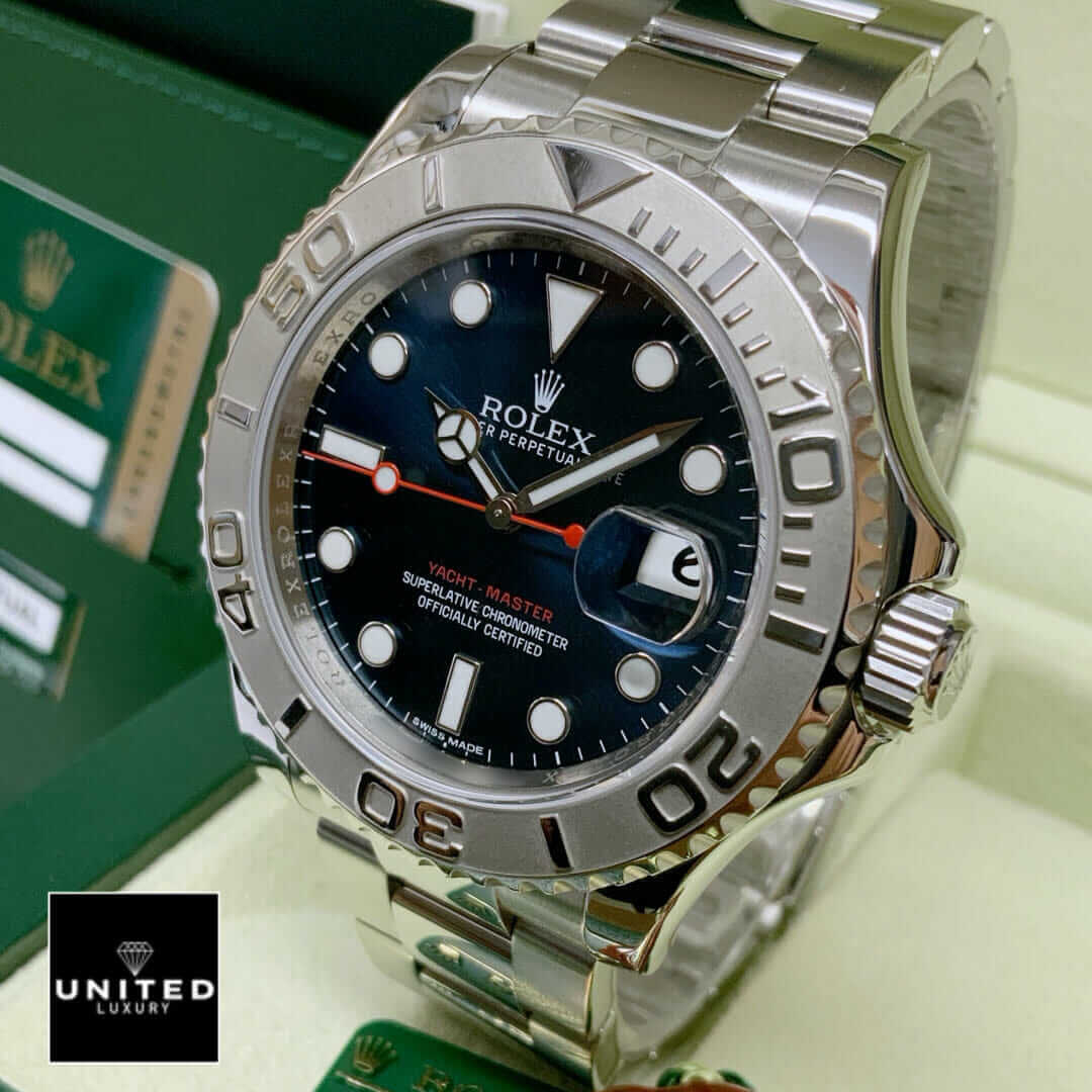 Rolex 116622 Yacht Master Oyster Replica next to warranty card