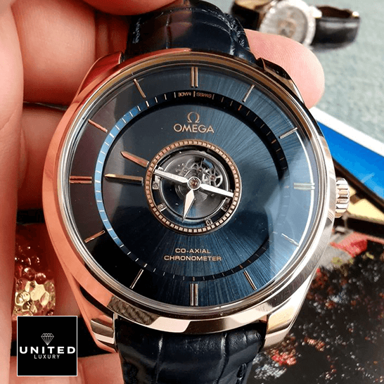 Omega Tourbillion Co Axıal Blue Dial Replica on the hand