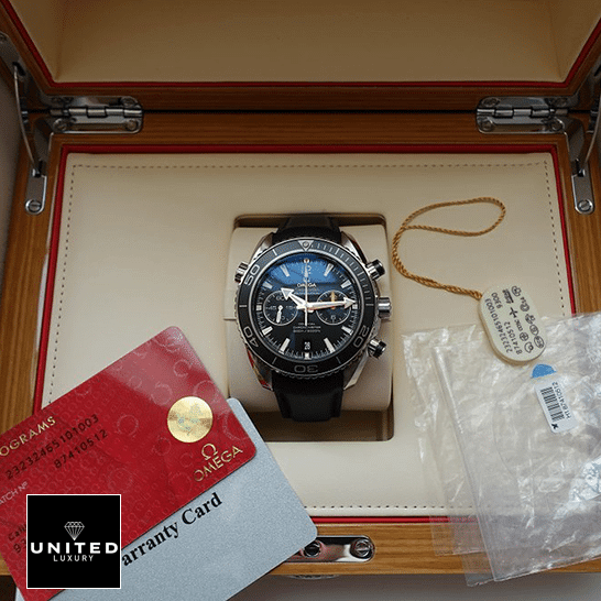 Omega Seamaster Full Blue Replica in the box next to warranty card