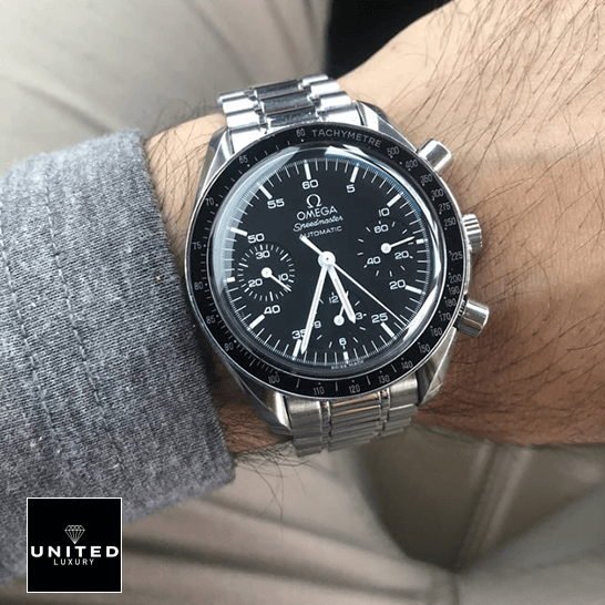 Omega Speedmaster Automatic Black Dial Replica on the man wrist