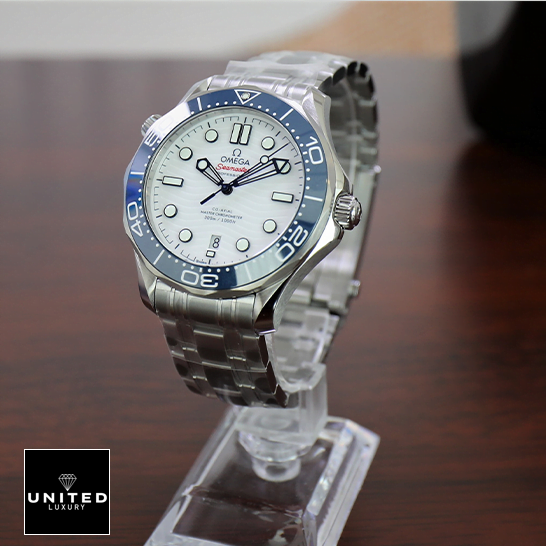 Omega Seamaster Blue Bezel White Dial Replica on the stand
