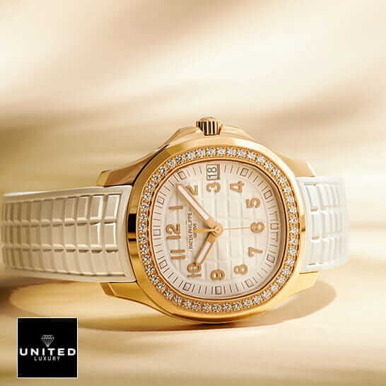 Patek Philippe Aquanaut Diamond Bezel White Dial Replica rose gold background