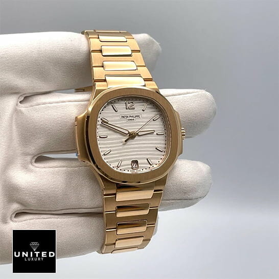 Patek Philippe Rose Gold White Dial Replica on the white glove hand white background