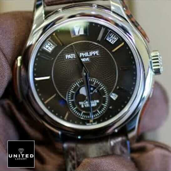 Patek Philippe Geneve Black Dial Steel Case Replica on the hand