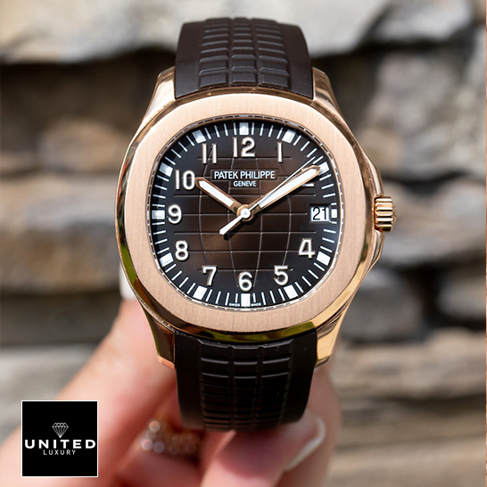 Patek Philippe Aquanaut Rose Gold Brown Dial Gold Case Replica on the hand