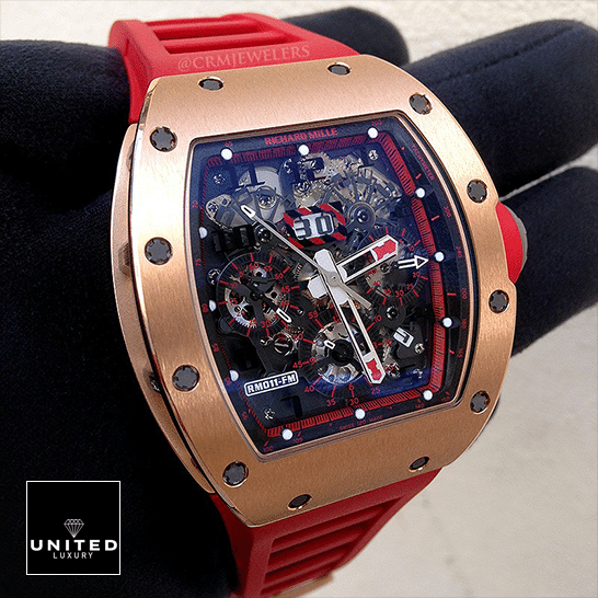 Richard Mille RM011 Red Demon Hand Dial Black Dial Replica on the black glove hand