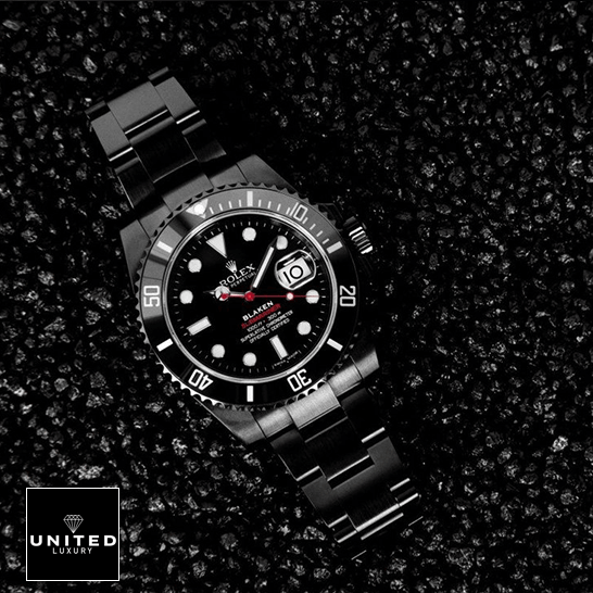 Rolex Blaken Submariner Black Dial Replica on the asphalt