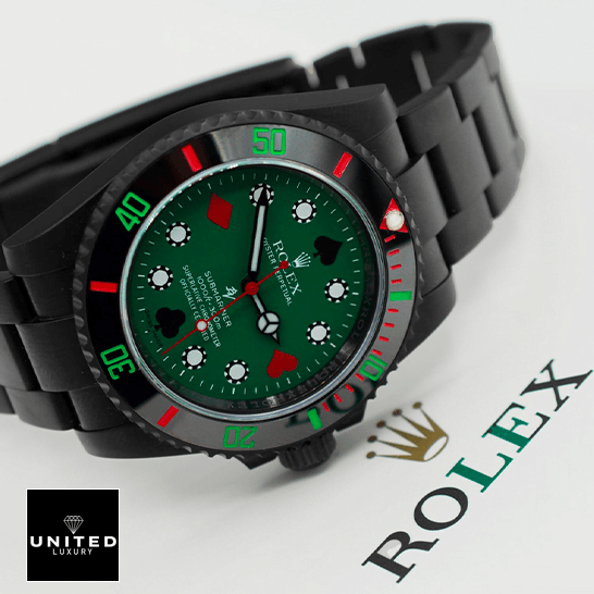 Rolex Blaken 114060 Submariner Poker Green Dial Replica on the rolex box