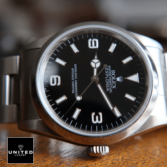 Rolex Explorer 124270 Stainless Steel Case and Bezel Replica on a wooden table