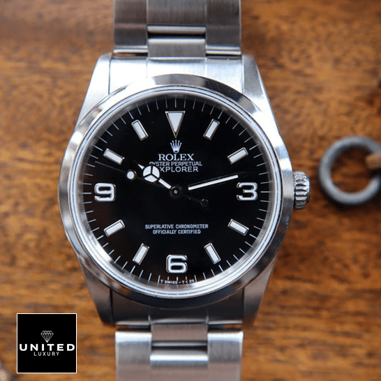 Rolex Explorer 124270 Black Dial Replica on the brown Table